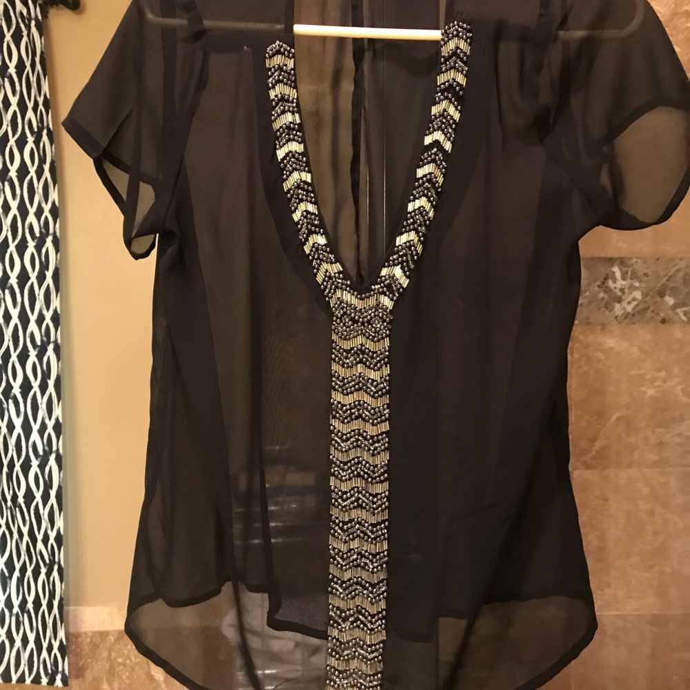 Sheer black v-neck with silver beading
